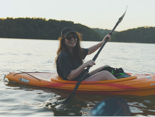 Smiling Woman in a Kayak
